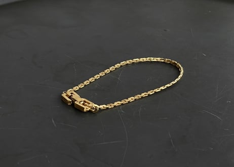 80-90s givenchy gold bracelet "Ａ"