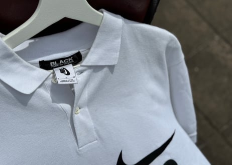 black comme des garcons nike logo polo shirt