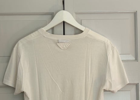 prada triangle rogo tops white