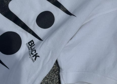 black comme des garcons nike logo polo shirt