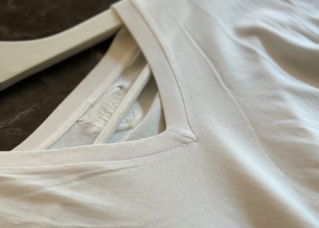 prada triangle rogo tops white