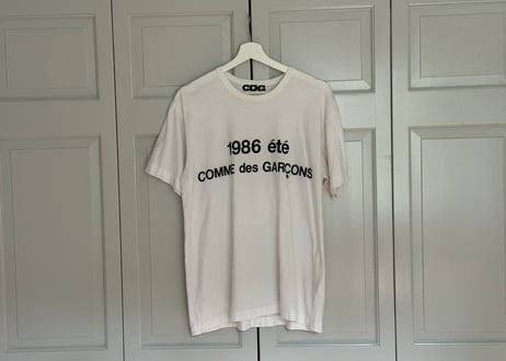 comme des garçons logo tops