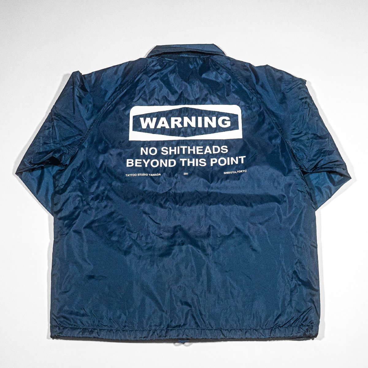 NYLON COACH JACKET【WARNING】// NAVY | tattoostud