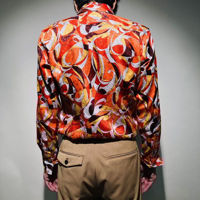 近年 未使用に近い エミリオプッチ スパンコール 総柄 シャツ ハンガー付 38 エミリオプッチEMILIO PUCCI フロントプッチ柄切替VネックT