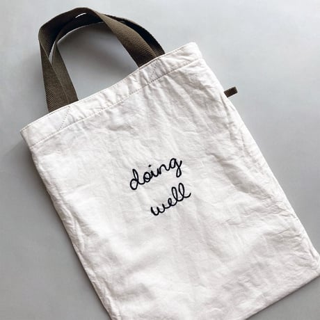"doing well"刺繍 A4ブリーフトートバッグ