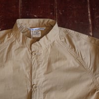NECESSARY OR UNNECESSARY   GARAGE COAT