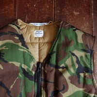 NECESSARY OR UNNECESSARY    CAMO VEST