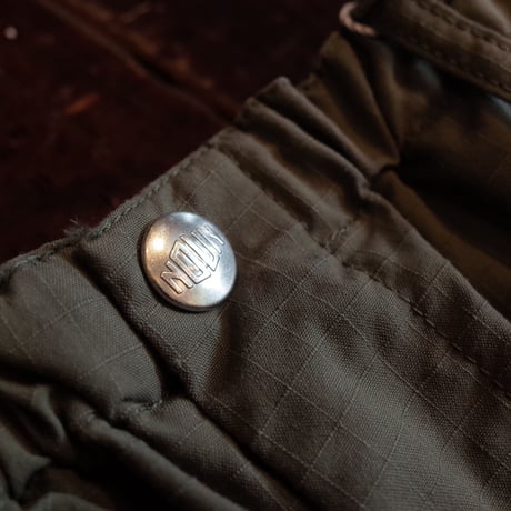 NECESSARY OR UNNECESSARY    PIN TUCK RIP STOP