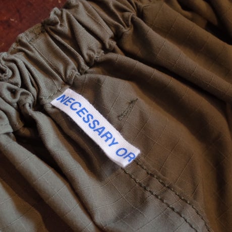 NECESSARY OR UNNECESSARY    PIN TUCK RIP STOP