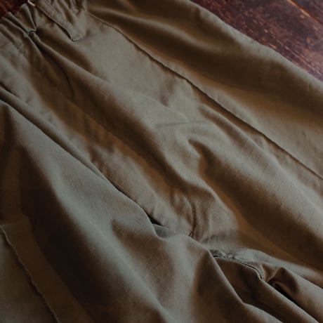 NECESSARY OR UNNECESSARY    PIN TUCK RIP STOP