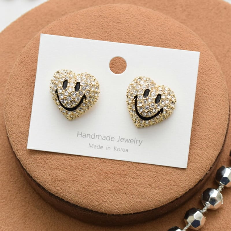 PROLOGUE プロローグ】ピアス キラキラ ハート型 立体 スマイル ニコ  