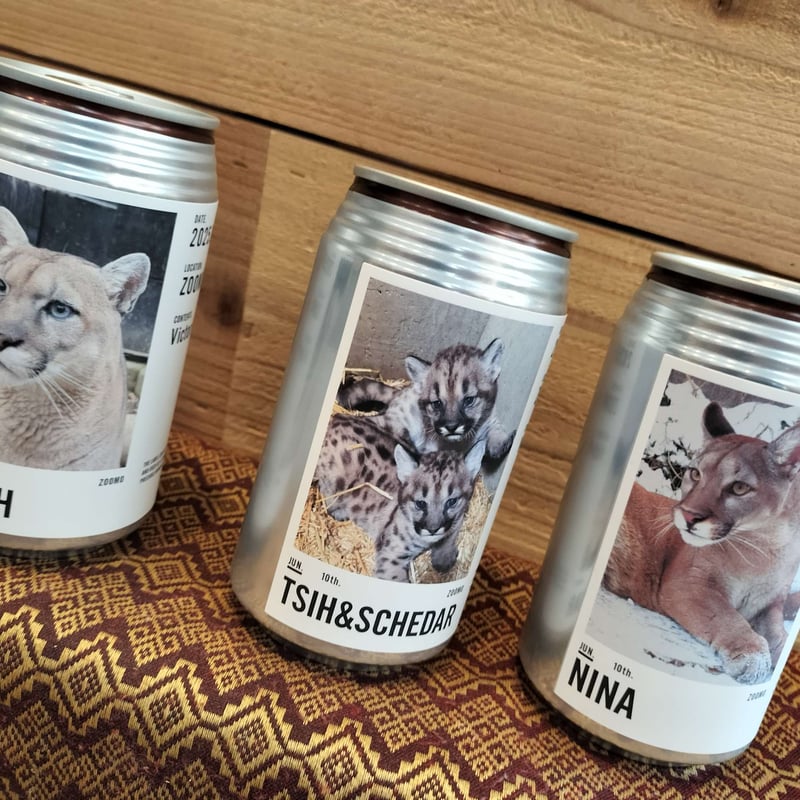 寄付付き】ピューマ年間カレンダー＆ラベル缶(ウーロン茶)セット