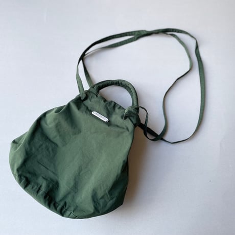 OLDMAN’S TAILOR R&D.M.Co. ガーメントダイドローストリングバッグ