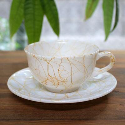 ヘーゼルアトラス ミッドナイトマジック カップ&ソーサー オレンジ