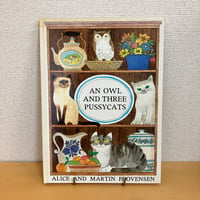 AN OWL AND THREE PUSSYCATS