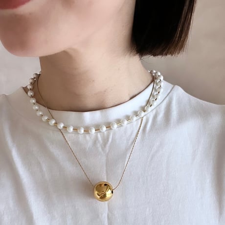 between petit pearls necklace