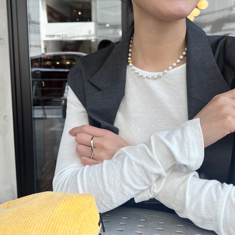 between petit pearls necklace