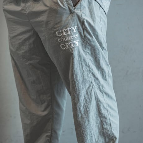 EMBROIDERED LOGO NYLON PANTS