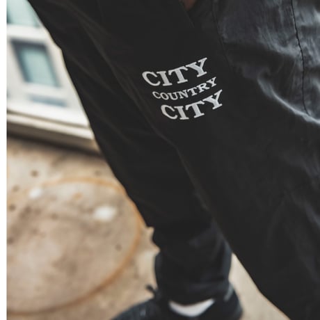 EMBROIDERED LOGO NYLON PANTS