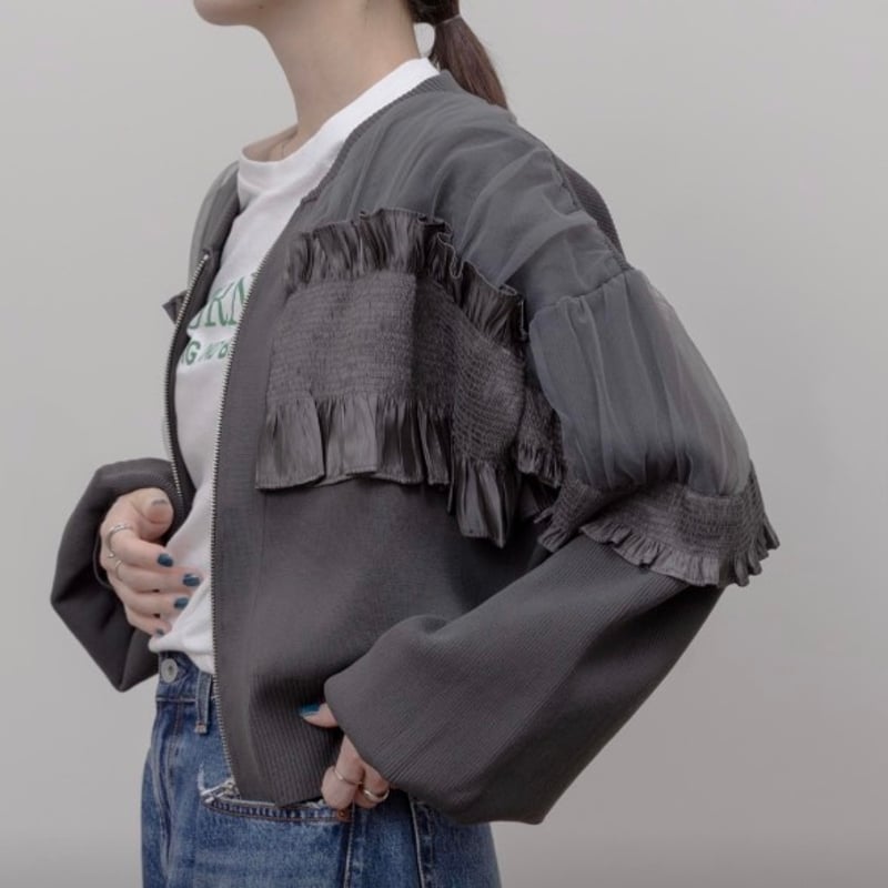 シャーリングフリルニットブルゾン | Aquila