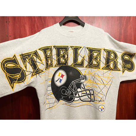 希少 FRUIT OF THE LOOMボディ NFL PITTSBURGH STEELERS プリントトレーナー 杢グレー XLサイズ
