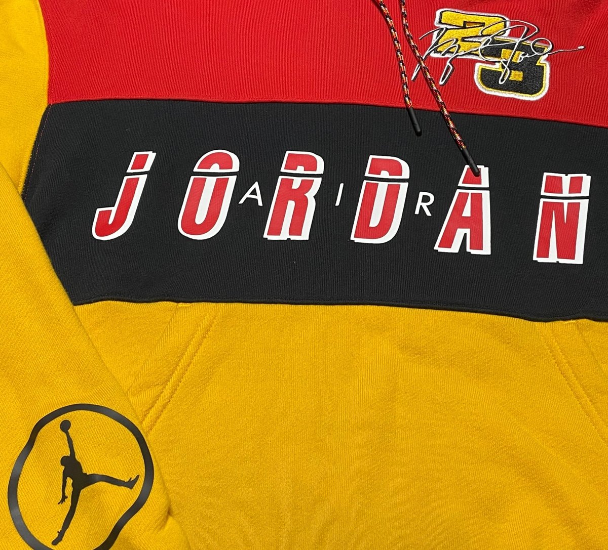 AIR JORDAN オーバーサイズロゴ入りプルオーバーパーカー