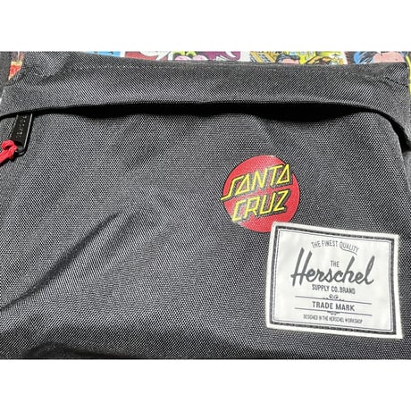 Herschel Supply × SANTA CRUZ Wネームコラボアメコミ柄バックパック ブラック Fサイズ