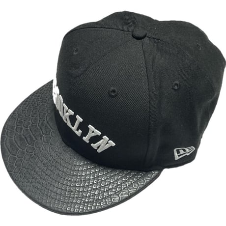 NEWERA BROOKLYN スネーク型押しスナップバックキャップ ブラック Fサイズ
