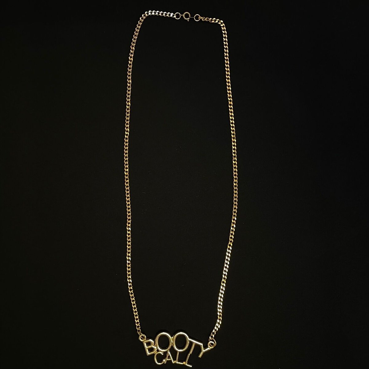 BOOTY CALL ペンダントヘッド付きネックレス ゴールド | Ultimate Star