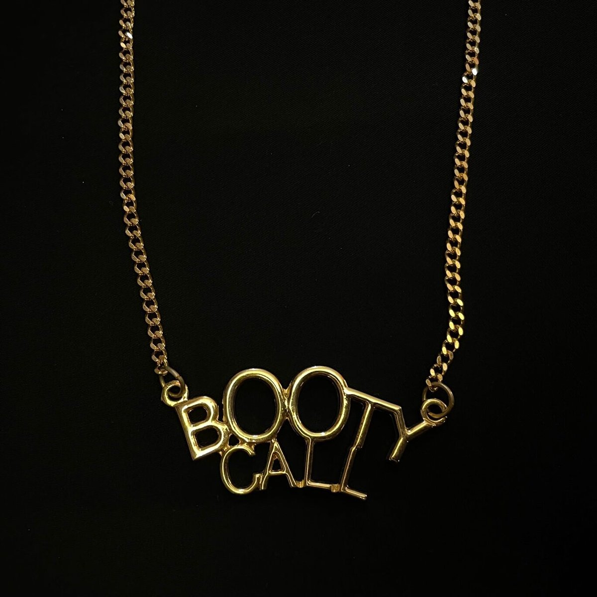 BOOTY CALL ペンダントヘッド付きネックレス ゴールド | Ultimate Star