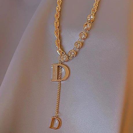 クリスタルストーン チェーンロゴネックレス 2色展開