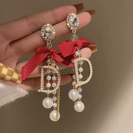 Dモチーフパール リボンピアス 2色展開