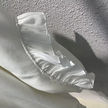 パールモチーフ タグフリルスウェットトップス 2色展開