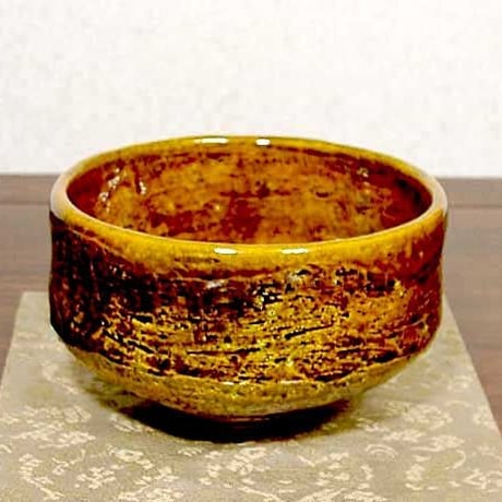 大樋焼　大樋一平（初代） 作　飴釉　茶碗　在銘　無傷　共箱。
