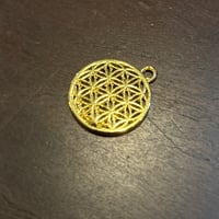トーラスをととのえるふるえるフラワーオブライフミニメタル