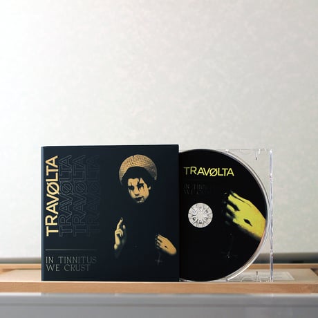 TRAVØLTA - in Tinnitus We Crust (CD)