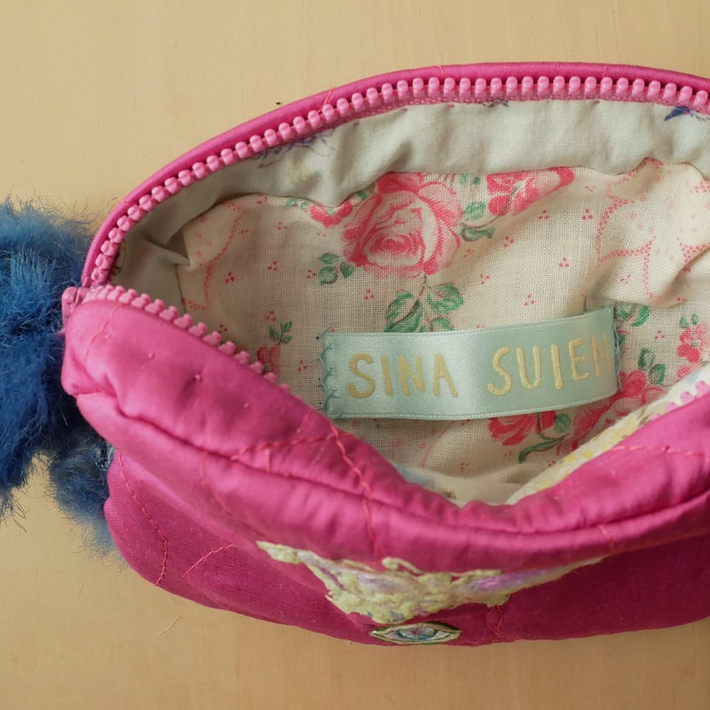 SINA SUIEN 