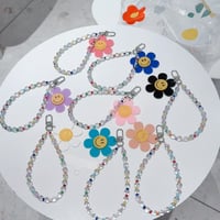CUTECASE 笑顔の花 スマホストラップ キラキラ感 お洒落 バックチャーム キーホルダー iPhone、Xperia、AQUOS、Xiaomi、Galaxy 対応 CM6295