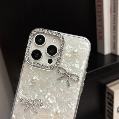 CUTECASE 女子力高いリボン iPhone16/17proケース パールデコ iPhone15promax/14pro/13 シェル風/キラキララメ ジュエリーカメラ枠CM5643