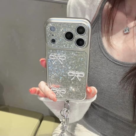CUTECASE ジュエリーリボン iPhone17/17Proケース キラキラグリッター iPhone16ProMax/15Pro/14カバー 毛玉ストラップ 大人可愛い CM5881