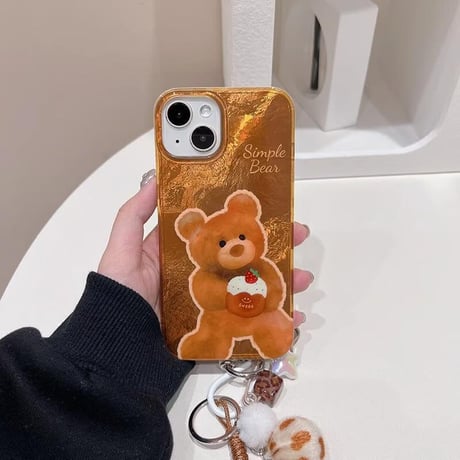 CUTECASE熊ちゃん iPhone16/16Proケース 光沢感 ブラウン アイフォン15プロ/14/13proカバー 毛玉ストラップ めっちゃ可愛い CM4820
