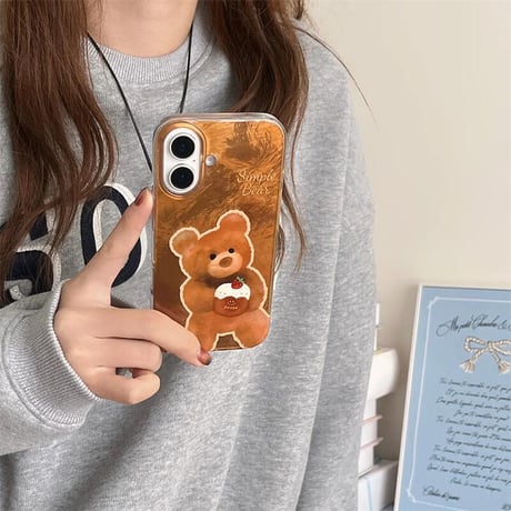 CUTECASE熊ちゃん iPhone16/16Proケース 光沢感 ブラウン アイフォン15プロ/14/13proカバー 毛玉ストラップ めっちゃ可愛い CM4820