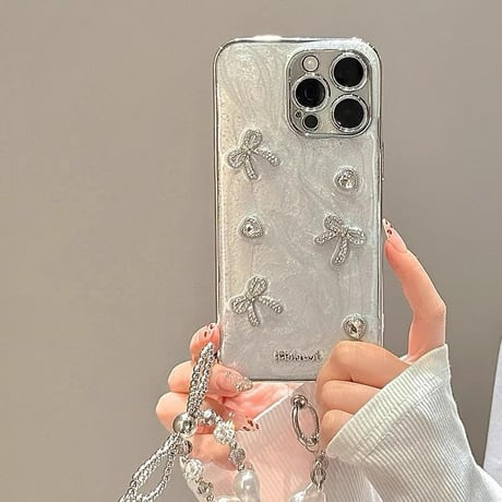 CUTECASE女子力アップ iPhone15Pro/15promaxカバー リボンデコアイフォン14プロ/13/12ケース きれいストラップ 2色 CM4367
