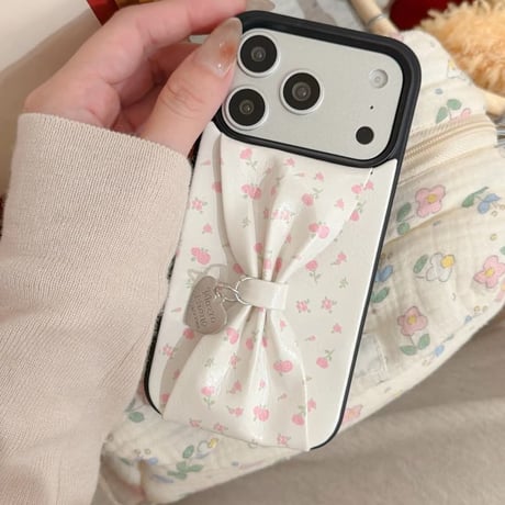 CUTECASE リボンベルト iPhone17Pro/17ケース 花柄 皮っぽ iPhone16Pro/15/14ケース 淡色系 ガーリーファッション人気品CM6085