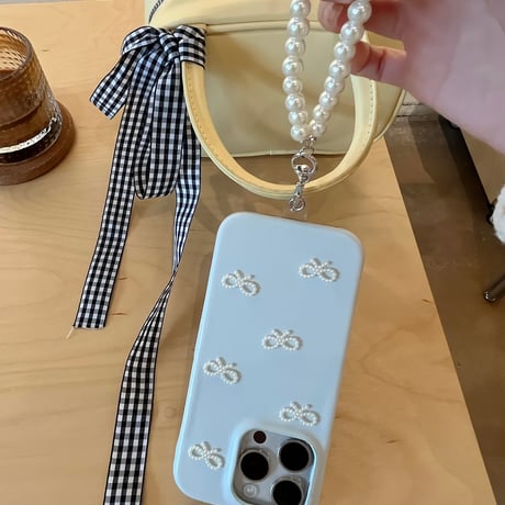 CUTECASE 流行の要素皮質ジュエリーリボン iPhone16/15proケース ホワイト iPhone14/13proケース かわいい 女子力アップ 高級感ストラップC6028