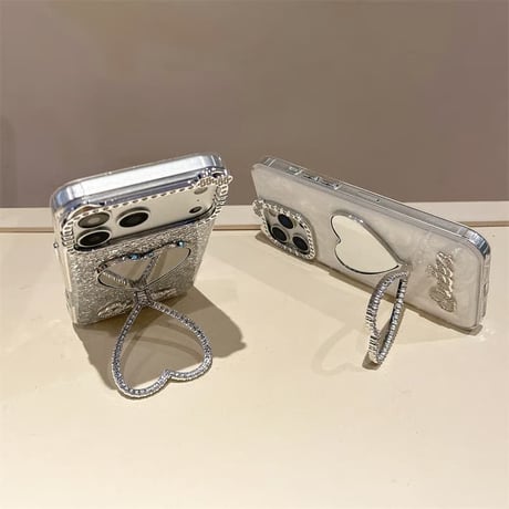 CUTECASEリボンと耳 iPhone17Pro/7ケース ミラーリングスタンド iPhone16ProMax/15/14ケース キラキララメ 便利CM6324