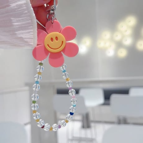 CUTECASE 笑顔の花 スマホストラップ キラキラ感 お洒落 バックチャーム キーホルダー iPhone、Xperia、AQUOS、Xiaomi、Galaxy 対応 CM6295