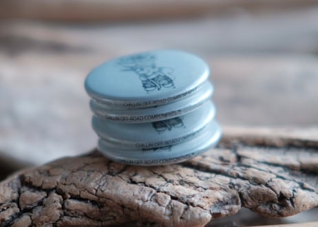 REFLECTOR *INTO THE WILD* PIN-BACK BUTTON
