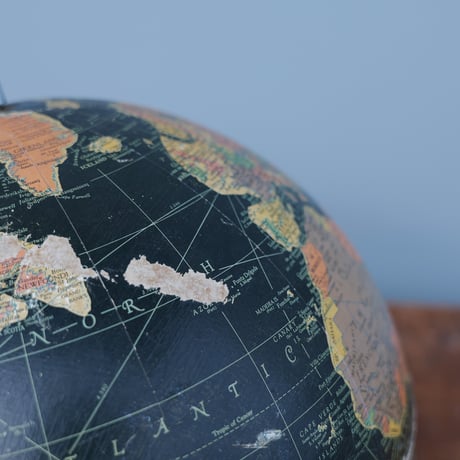60s black ocean globe