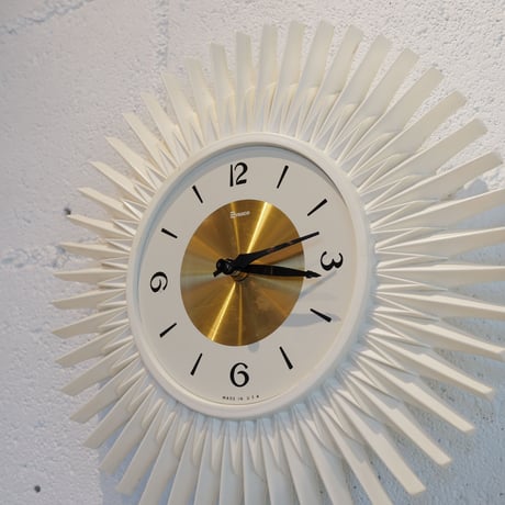 70s White Sunburst clock